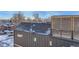 Modern home exterior with a sleek rooftop deck showcasing neighborhood and distant city views at 1928 W 41St Ave, Denver, CO 80211