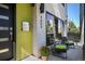 Inviting front porch with comfortable seating, a potted plant and view of the address at 3453 Navajo St, Denver, CO 80211