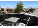 Rooftop deck view features a patio table and chairs, as well as a city skyline beyond at 3453 Navajo St, Denver, CO 80211