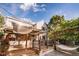 Backyard with a patio, a deck, and a hammock at 10154 Fairgate Way, Highlands Ranch, CO 80126
