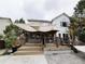 Multi-level deck with awning offering relaxation and entertainment space at 10154 Fairgate Way, Highlands Ranch, CO 80126