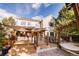 Backyard with a patio, a deck, and a hammock at 10154 Fairgate Way, Highlands Ranch, CO 80126