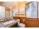 Bathroom featuring granite countertop and bronze fixtures at 10154 Fairgate Way, Highlands Ranch, CO 80126