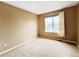 Cozy bedroom features a neutral color palette, carpeted floors, and great natural light at 10154 Fairgate Way, Highlands Ranch, CO 80126