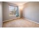 Bedroom with carpeted floors, neutral paint and a window at 10154 Fairgate Way, Highlands Ranch, CO 80126