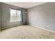 Bedroom with carpeted floors, window with blinds, and room for a queen size bed at 10154 Fairgate Way, Highlands Ranch, CO 80126
