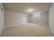 Spacious bedroom features neutral carpet, fresh paint, and a window for natural light at 6772 Vista Lodge Loop, Castle Pines, CO 80108