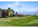 Enjoy views of the lush green golf course and the snow-capped mountain range at 6772 Vista Lodge Loop, Castle Pines, CO 80108