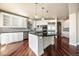 Modern kitchen with stainless steel appliances and center island at 6772 Vista Lodge Loop, Castle Pines, CO 80108