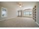 Spacious main bedroom featuring carpet, built in shelving and large windows at 6772 Vista Lodge Loop, Castle Pines, CO 80108