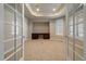 Bright office featuring a built-in desk and large windows with custom shutters at 6772 Vista Lodge Loop, Castle Pines, CO 80108