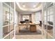 Stylish home office featuring a modern desk, comfortable seating, and ample natural light at 6772 Vista Lodge Loop, Castle Pines, CO 80108