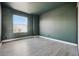 Bedroom with a large window and ample natural light at 19658 E Vassar Dr, Aurora, CO 80013