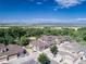 Aerial view of townhomes nestled among lush trees at 14916 E Crestridge Pl, Centennial, CO 80015