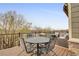 Inviting outdoor deck with a wrought-iron dining set offering scenic views for relaxing or dining al fresco at 14916 E Crestridge Pl, Centennial, CO 80015