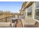 Comfortable outdoor seating area on a spacious deck, ideal for enjoying the outdoors, with scenic views at 14916 E Crestridge Pl, Centennial, CO 80015