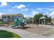 Community playground with slides, swings, and gazebo at 14916 E Crestridge Pl, Centennial, CO 80015