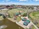 The community lake has walking paths and covered picnic tables for Gathering fun at 307 Inverness S Way # 307, Englewood, CO 80112