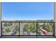 Spacious balcony features a black metal railing and expansive views of the surrounding neighborhood at 307 Inverness S Way # 307, Englewood, CO 80112