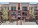 Attractive three-story condo building showcasing balconies and easy access parking at 307 Inverness S Way # 307, Englewood, CO 80112