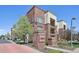 Well maintained Avalon Inverness complex with manicured landscaping and brick facade at 307 Inverness S Way # 307, Englewood, CO 80112