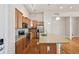 Kitchen boasts granite counters, wood cabinets, and stainless steel appliances at 307 Inverness S Way # 307, Englewood, CO 80112
