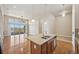 Spacious kitchen island with sink and stainless steel dishwasher, perfect for entertaining at 307 Inverness S Way # 307, Englewood, CO 80112