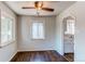Dining room showcasing hardwood floors, a ceiling fan, and ample natural light at 3311 S Eudora St, Denver, CO 80222