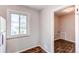 Room with a view to the backyard, showing a window with white trim at 3311 S Eudora St, Denver, CO 80222