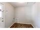 Neutral toned room features modern flooring and an electric panel at 3311 S Eudora St, Denver, CO 80222