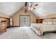 Large bedroom with French doors, and neutral walls at 36920 Forest Trl, Elizabeth, CO 80107