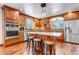 Modern kitchen featuring stainless steel appliances, granite countertops, and custom cabinetry at 36920 Forest Trl, Elizabeth, CO 80107