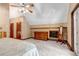 Bright bedroom featuring vaulted ceilings and ample closet and dresser storage at 36920 Forest Trl, Elizabeth, CO 80107