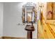 Unique powder room with decorative mirror and vessel sink at 36920 Forest Trl, Elizabeth, CO 80107