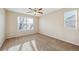 Bright bedroom with carpet flooring and ceiling fan at 10219 Vine Ct, Thornton, CO 80229