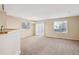 Spacious dining area with carpet and sliding glass doors at 10219 Vine Ct, Thornton, CO 80229