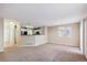 Open dining area with kitchen access and a view of the backyard at 10219 Vine Ct, Thornton, CO 80229