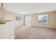 Bright dining area with carpet flooring and sliding glass doors at 10219 Vine Ct, Thornton, CO 80229