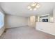 Open dining area with kitchen views and carpet at 10219 Vine Ct, Thornton, CO 80229