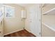 Laundry room with washer/dryer hookups and shelving at 10219 Vine Ct, Thornton, CO 80229