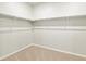 Spacious walk-in closet with double hanging rods at 17355 E 91St Pl, Commerce City, CO 80022