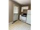 Functional kitchen with white appliances and cabinets, offering a practical space for cooking and meal preparation at 804 S 1St Ave, Brighton, CO 80601