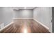 Finished basement featuring wood-look floors and painted walls at 5635 Nebraska Way, Denver, CO 80224