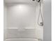 Bright white bathroom and shower with clean design features at 5635 Nebraska Way, Denver, CO 80224