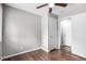 Comfortable bedroom with ceiling fan and closet space, offering a relaxing atmosphere at 5635 Nebraska Way, Denver, CO 80224