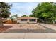 Charming single-story home featuring a low maintenance yard and driveway at 5635 Nebraska Way, Denver, CO 80224
