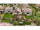 Aerial view showcasing a home with solar panels, a patio, trampoline and beautifully landscaped yard at 10632 Star Thistle Ct, Highlands Ranch, CO 80126