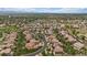 Beautiful aerial view of a neighborhood, with houses nestled amongst lush greenery and winding streets at 10632 Star Thistle Ct, Highlands Ranch, CO 80126