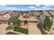 Stunning single-Gathering home boasts mature trees, brick accents and a manicured lawn at 10632 Star Thistle Ct, Highlands Ranch, CO 80126