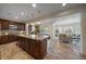 Spacious kitchen with granite countertops, tile floor, and stainless steel appliances at 10632 Star Thistle Ct, Highlands Ranch, CO 80126